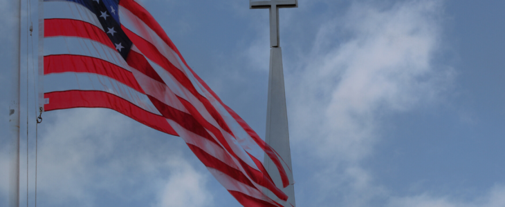 |Protecting Religious Freedom. Ecclesiastical Abstention Doctrine. Church and State|The American Flag flies over a steeple with the Christian Cross